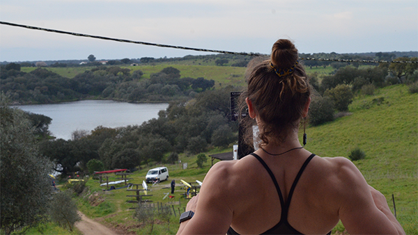 woman on rowing machine in countryside